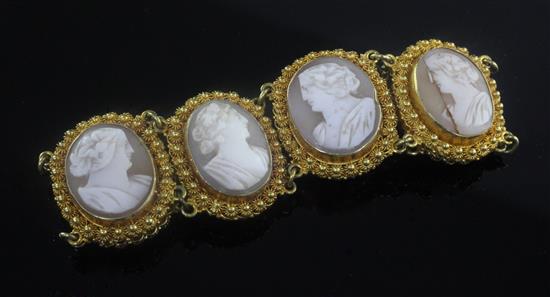 An early 20th century gold and cameo set bracelet, approx. 6.5in.